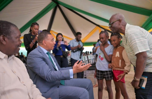 Jamaica: 200 Tivoli Gardens residents receive land possession certificates